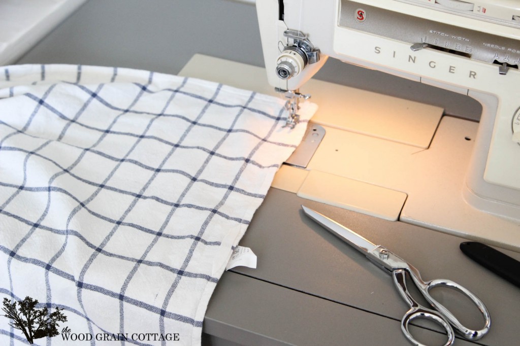 Use kitchen tea towels to make your own pillows! Full tutorial by The Wood Grain Cottage