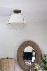 A picture of a light in an entry.