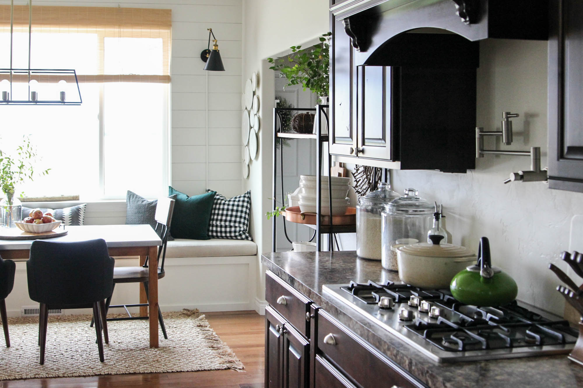 A picture of a kitchen and breakfast nook.