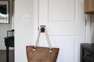 A picture of an interior door installed and painted.