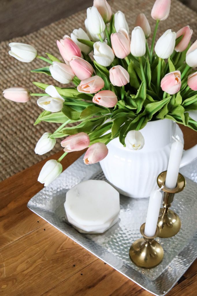 A picture of faux tulips on our coffee table. 