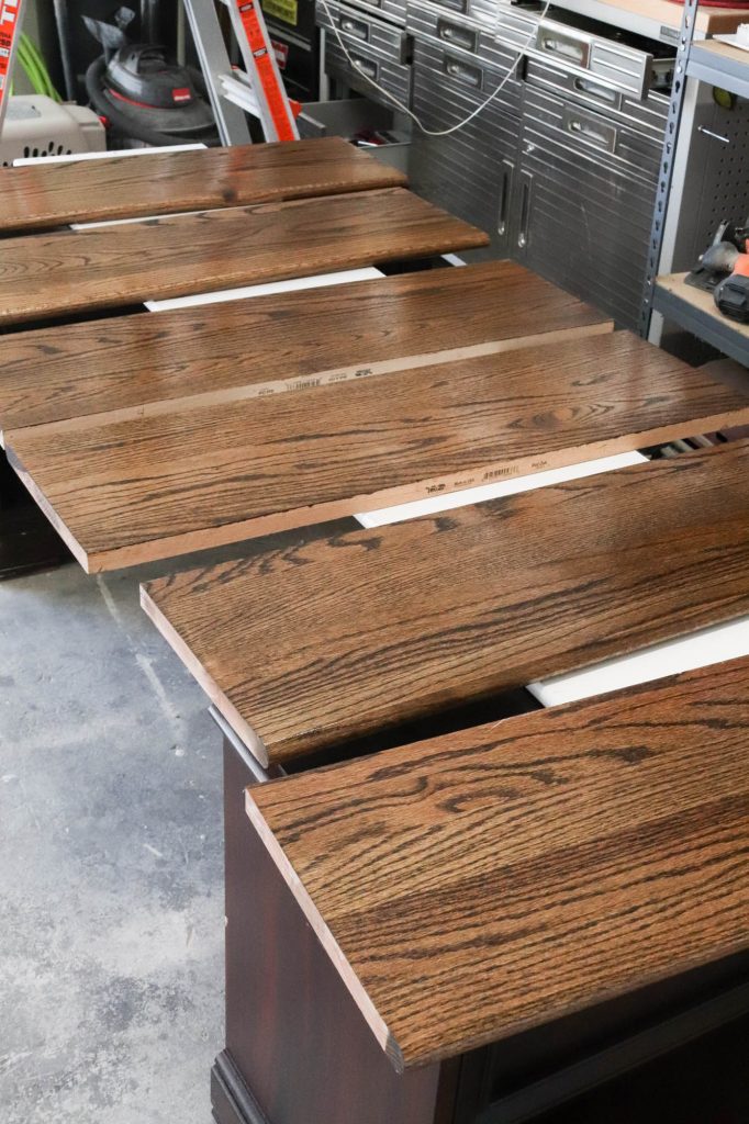 A picture of the stair treads with the first coat of polyurethane. 