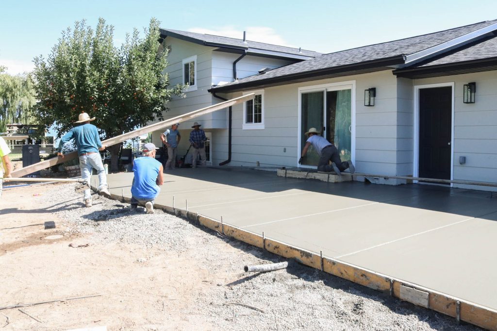 A picture showing the new concrete being poured. 