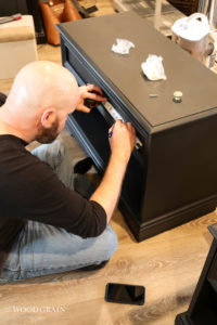 A picture showing Todd installing the new hardware.