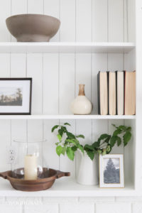 A picture of our open shelves styled for fall.