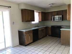 A picture of the kitchen when we bought the house.