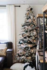 A picture showing the silver and gold flocked Christmas tree.